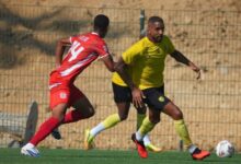 لاعبو المغرب الفاسي خلال المباراة الودية أمام حسنية أكادير بأكادير