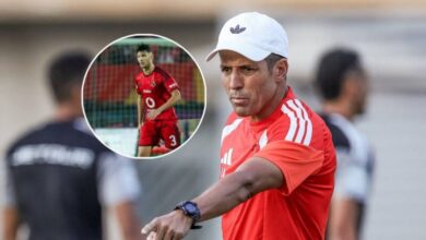 حسين عموتة وأشرف داري خلال مباراة الأهلي والزمالك